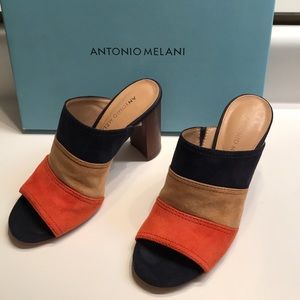 Multi colored suede heels.